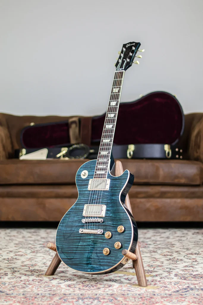 Gibson Les Paul Standard electric guitar in blueberry burst finish with flamed maple top on a wooden stand.